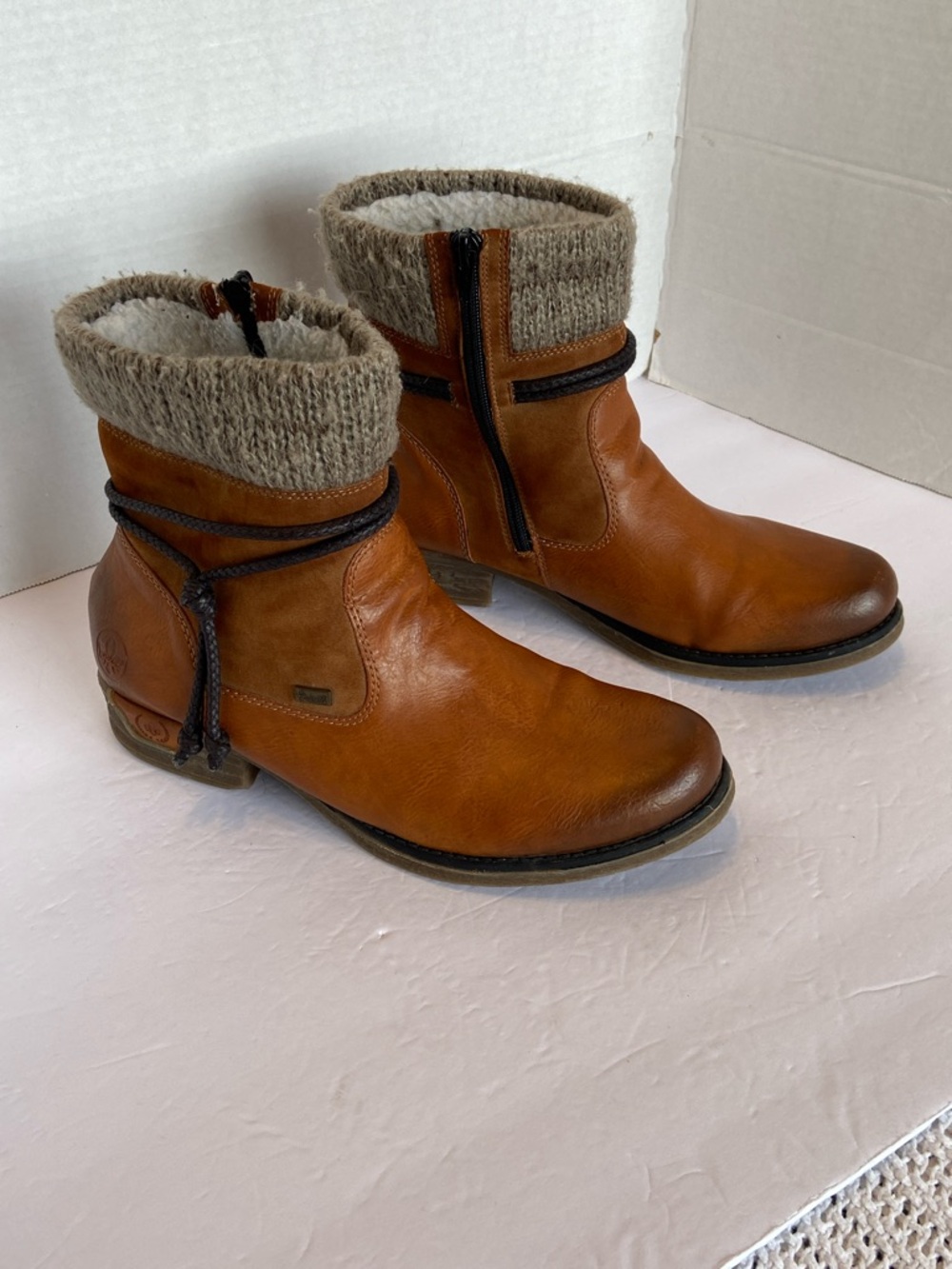 Rieker Cayenne leather ankle boots, featuring a knit cuff lacing zippers 10-10.5